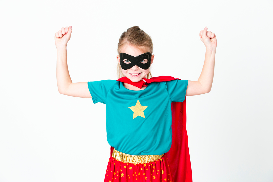 blond supergirl with black mask and red cape