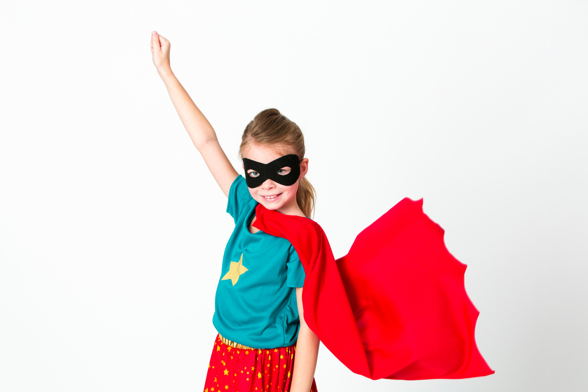 blond supergirl with black mask and red cape